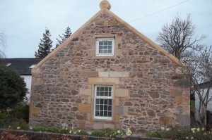 white paint removed , repointed and new stonework built at skews